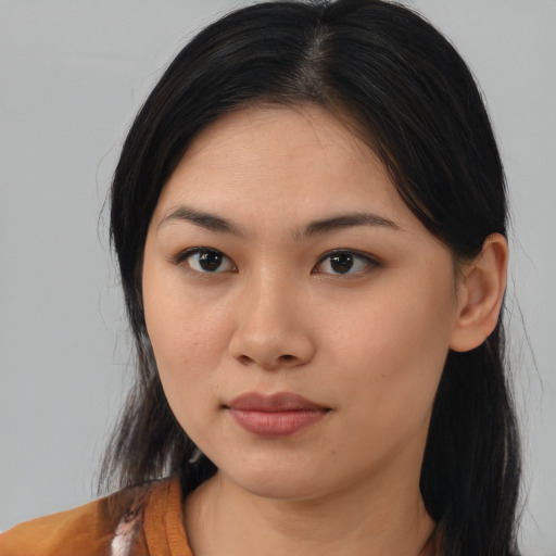 Neutral asian young-adult female with medium  brown hair and brown eyes