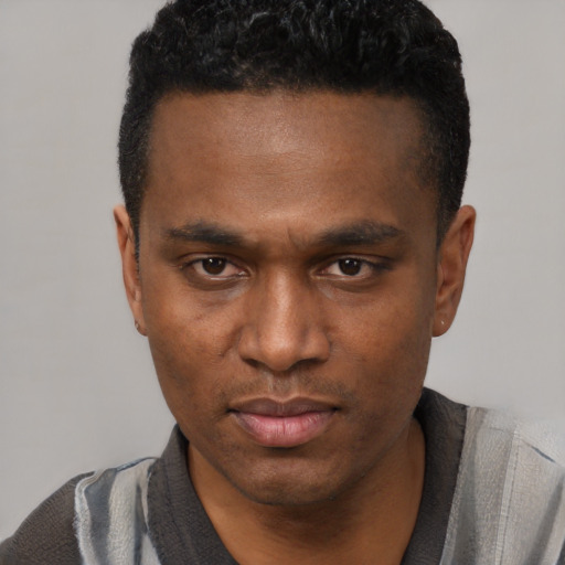 Neutral black young-adult male with short  black hair and brown eyes