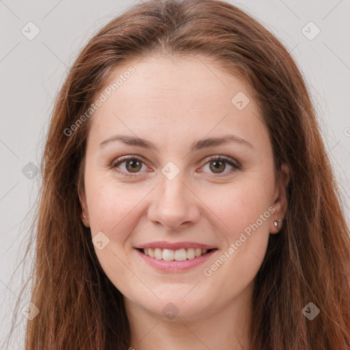 Joyful white young-adult female with long  brown hair and grey eyes