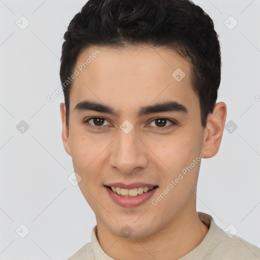 Joyful latino young-adult male with short  brown hair and brown eyes