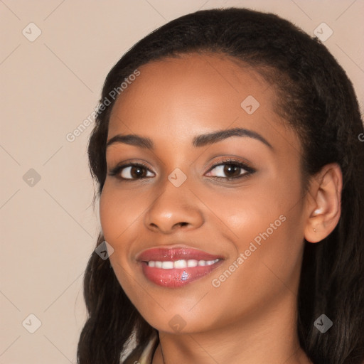 Joyful latino young-adult female with long  black hair and brown eyes