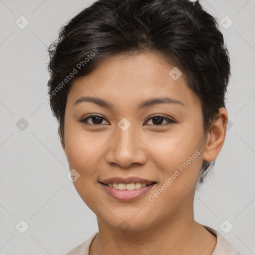 Joyful latino young-adult female with short  brown hair and brown eyes