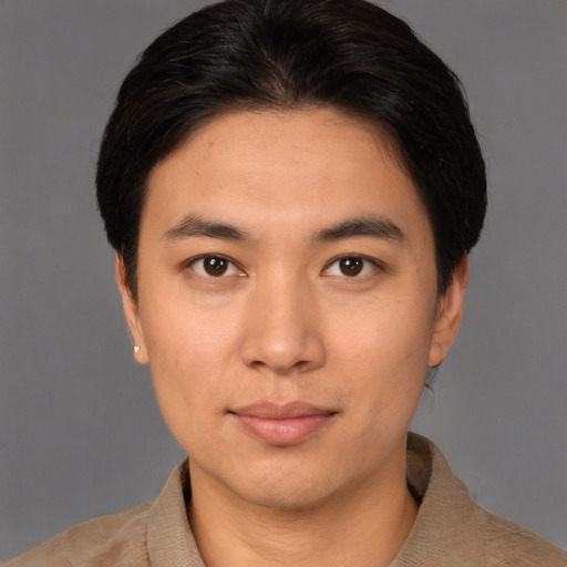 Neutral asian young-adult male with short  brown hair and brown eyes