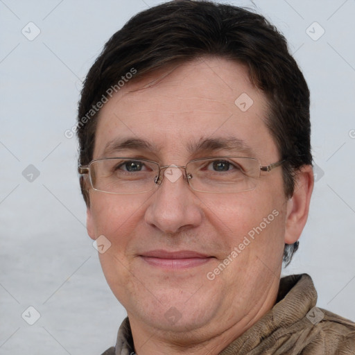 Joyful white adult male with short  brown hair and brown eyes