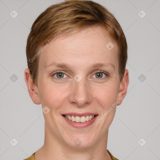 Joyful white young-adult female with short  brown hair and grey eyes