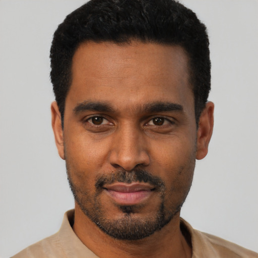 Neutral black young-adult male with short  black hair and brown eyes