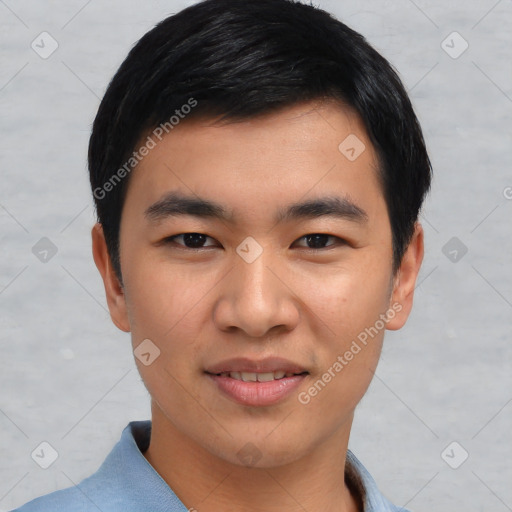 Joyful asian young-adult male with short  black hair and brown eyes