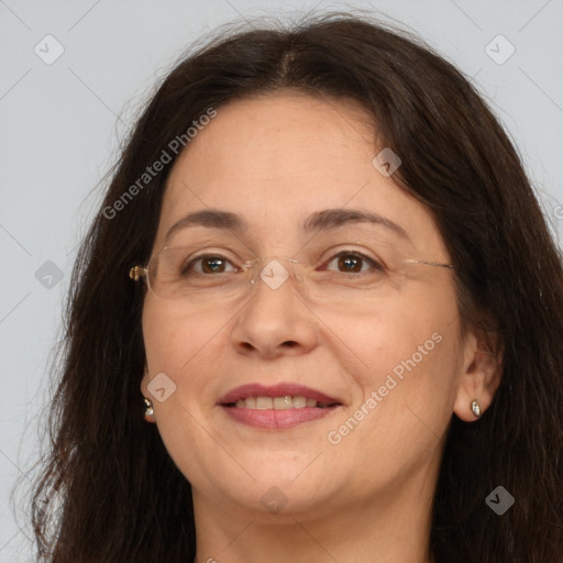 Joyful white adult female with medium  brown hair and brown eyes