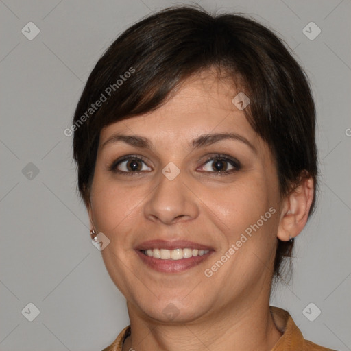 Joyful white adult female with medium  brown hair and brown eyes