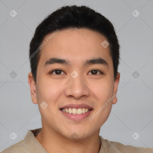 Joyful white young-adult male with short  black hair and brown eyes