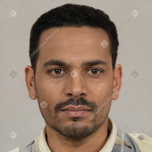 Neutral latino young-adult male with short  black hair and brown eyes