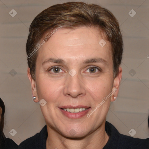 Joyful white adult female with short  brown hair and brown eyes