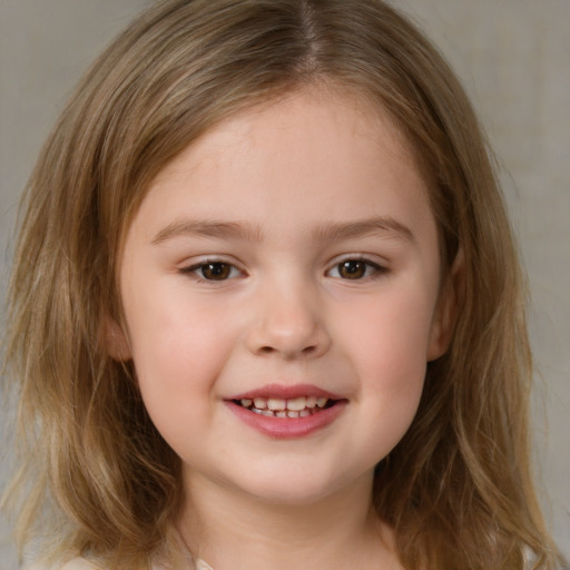 Joyful white child female with medium  brown hair and brown eyes