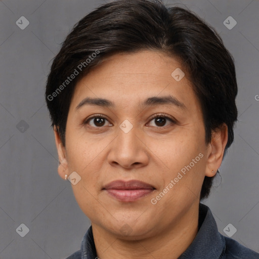 Joyful white adult female with short  brown hair and brown eyes