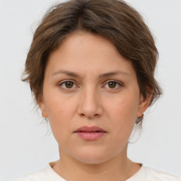 Neutral white young-adult female with short  brown hair and brown eyes