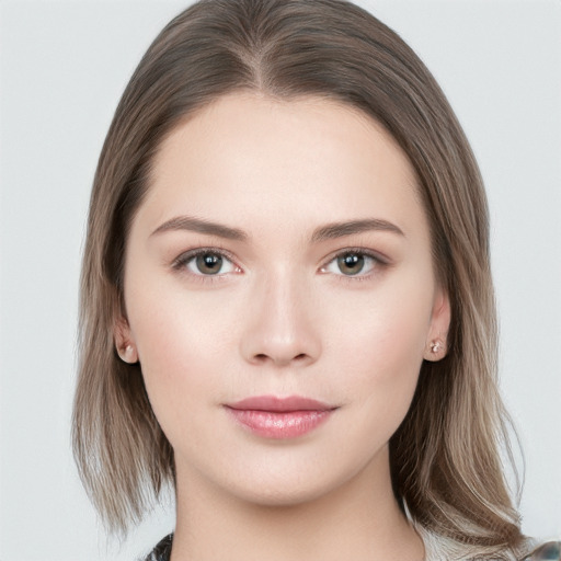 Neutral white young-adult female with long  brown hair and brown eyes