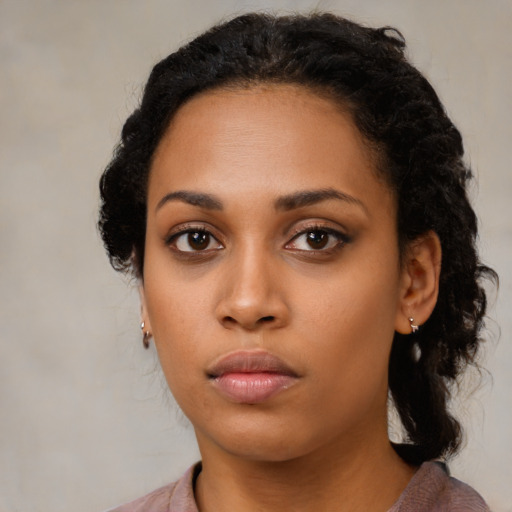 Neutral black young-adult female with medium  black hair and brown eyes