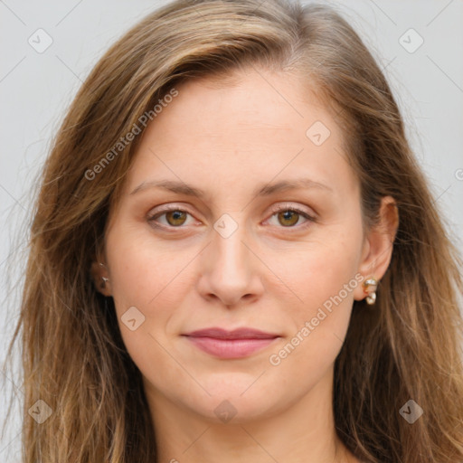 Joyful white young-adult female with long  brown hair and green eyes