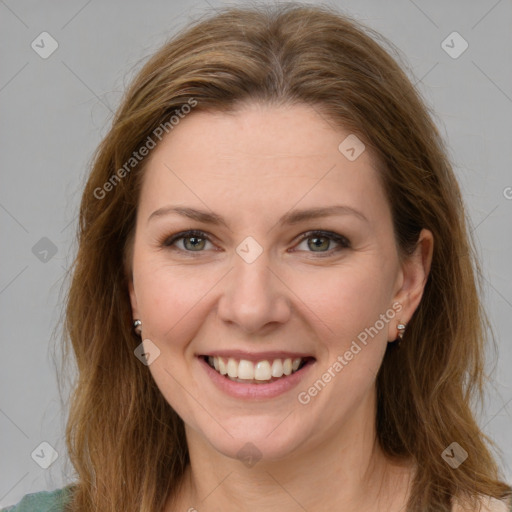 Joyful white young-adult female with medium  brown hair and green eyes