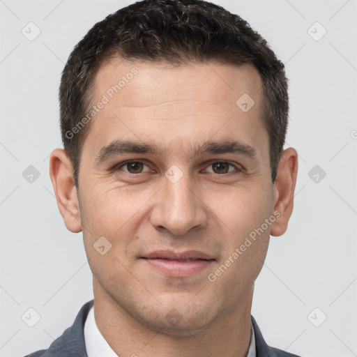 Joyful white young-adult male with short  brown hair and brown eyes