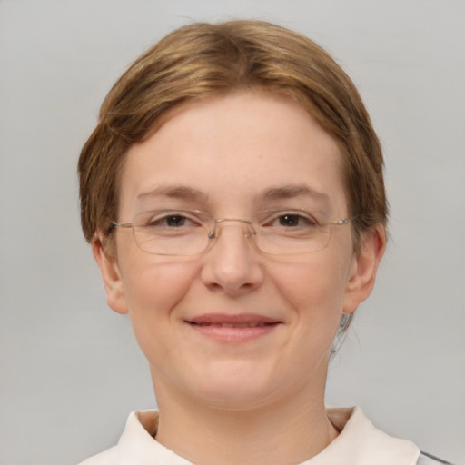 Joyful white adult female with short  brown hair and brown eyes