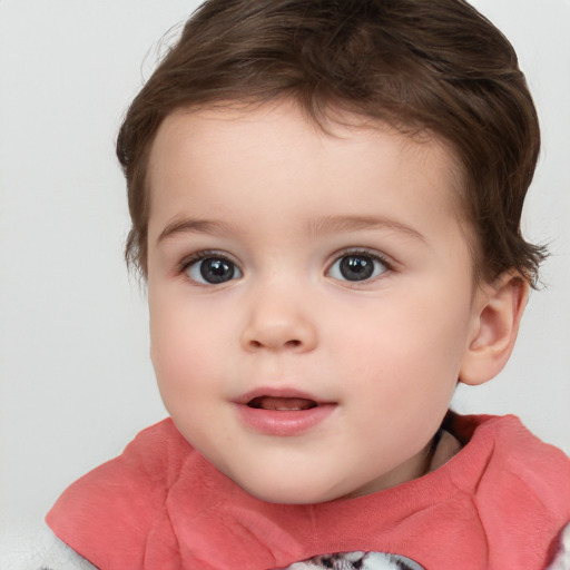 Joyful white child female with short  brown hair and brown eyes