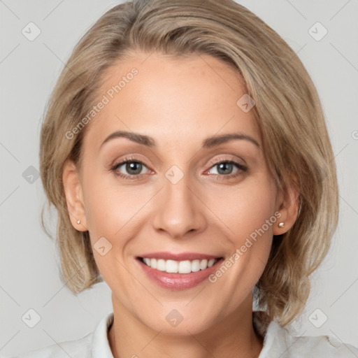 Joyful white young-adult female with medium  brown hair and blue eyes