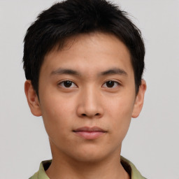 Neutral asian young-adult male with short  brown hair and brown eyes