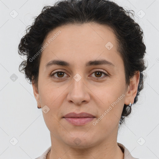 Joyful white adult female with short  brown hair and brown eyes