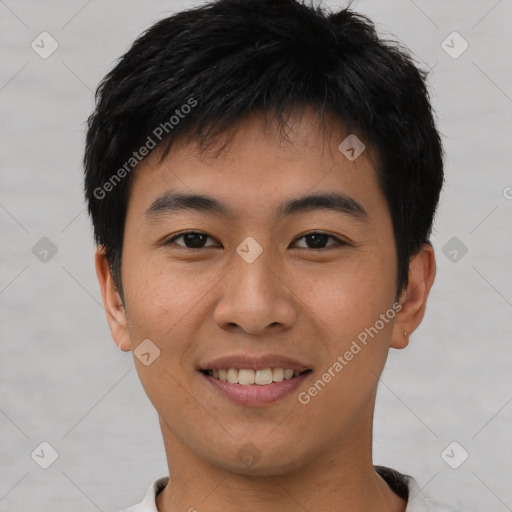 Joyful asian young-adult male with short  brown hair and brown eyes