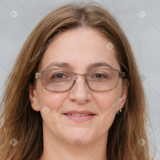 Joyful white adult female with long  brown hair and brown eyes