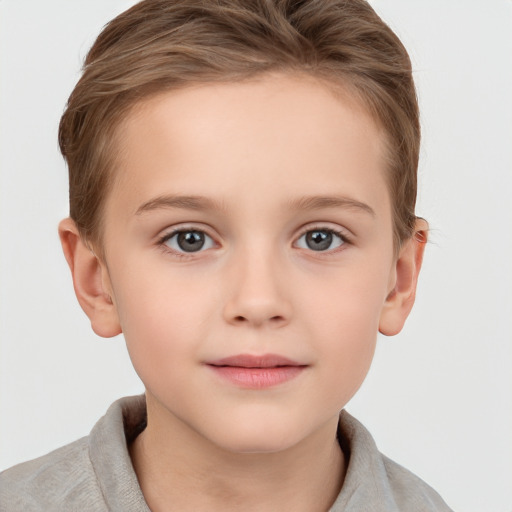 Joyful white child female with short  brown hair and grey eyes