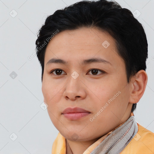 Joyful asian young-adult female with short  brown hair and brown eyes