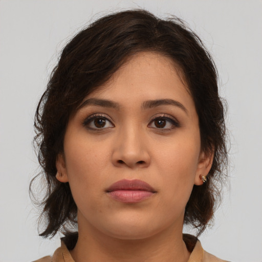 Neutral asian young-adult female with medium  brown hair and brown eyes