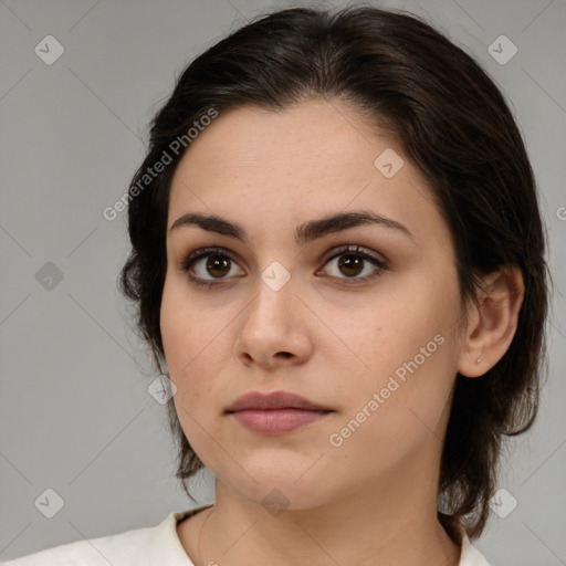 Neutral white young-adult female with medium  brown hair and brown eyes