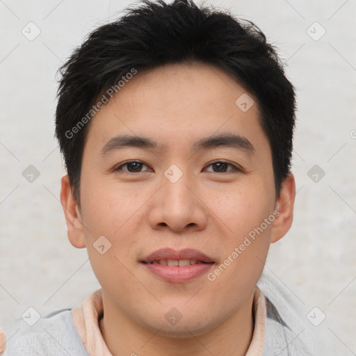 Joyful asian young-adult male with short  brown hair and brown eyes