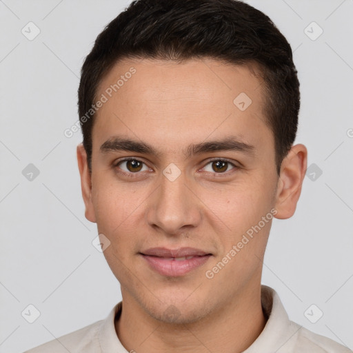 Joyful white young-adult male with short  brown hair and brown eyes