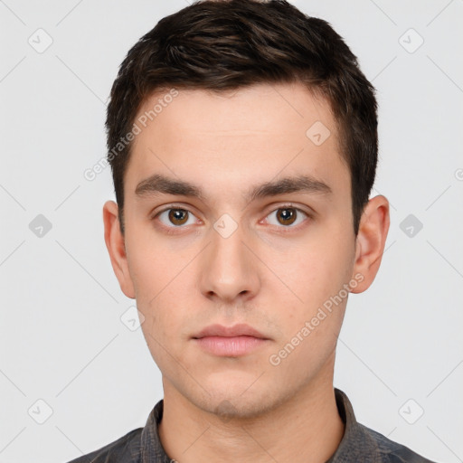 Neutral white young-adult male with short  brown hair and brown eyes