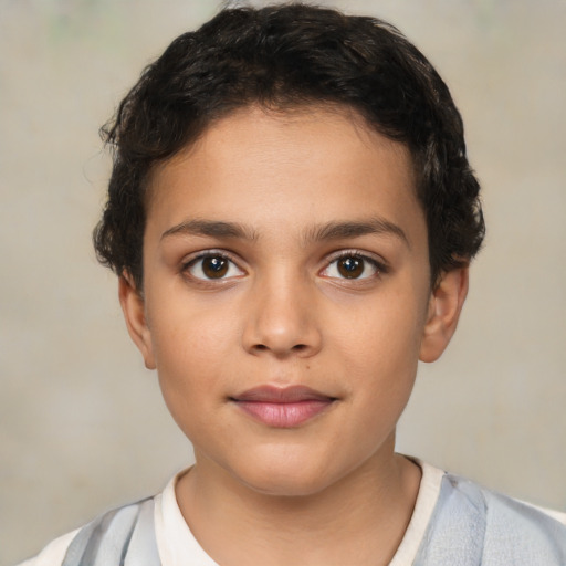 Joyful latino child female with short  brown hair and brown eyes