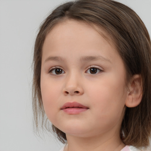 Neutral white child female with medium  brown hair and brown eyes