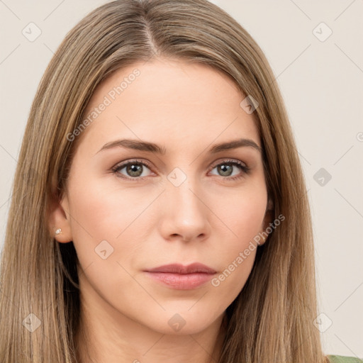 Neutral white young-adult female with long  brown hair and brown eyes