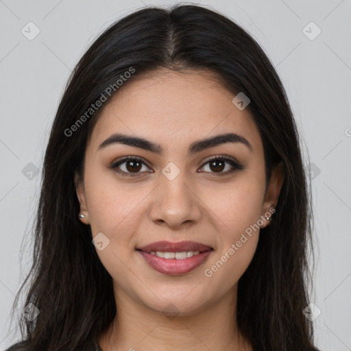 Joyful latino young-adult female with long  brown hair and brown eyes