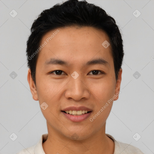 Joyful asian young-adult male with short  black hair and brown eyes