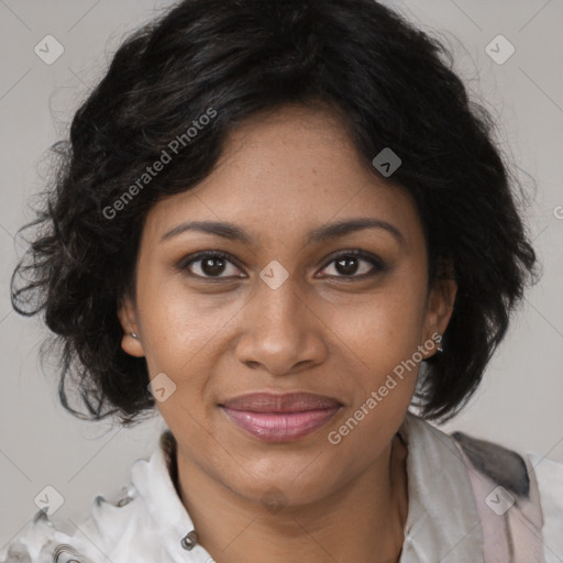 Joyful black adult female with medium  brown hair and brown eyes