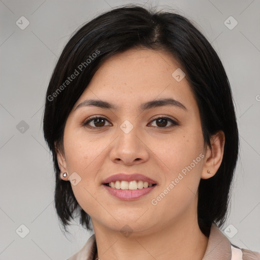 Joyful asian young-adult female with medium  black hair and brown eyes