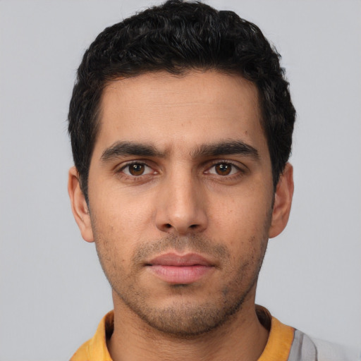 Neutral white young-adult male with short  black hair and brown eyes