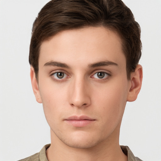 Neutral white young-adult male with short  brown hair and brown eyes