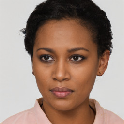 Neutral black young-adult female with short  black hair and brown eyes