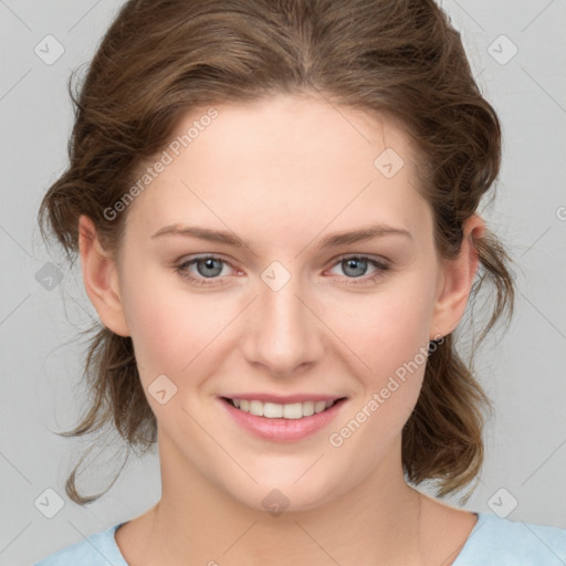 Joyful white young-adult female with medium  brown hair and blue eyes