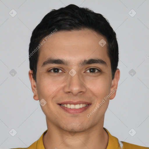 Joyful white young-adult male with short  black hair and brown eyes